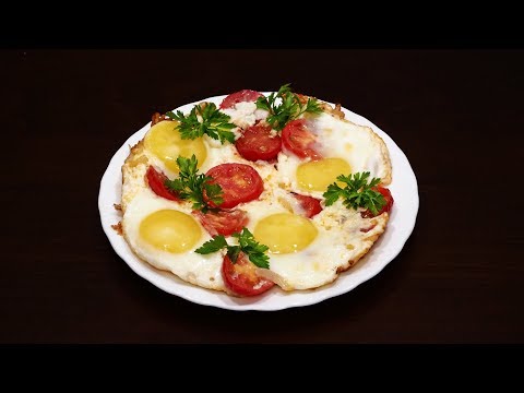 Fried eggs with tomatoes: five effective recipes and cooking tricks