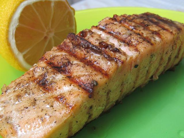 Juicy salmon steak with lemon