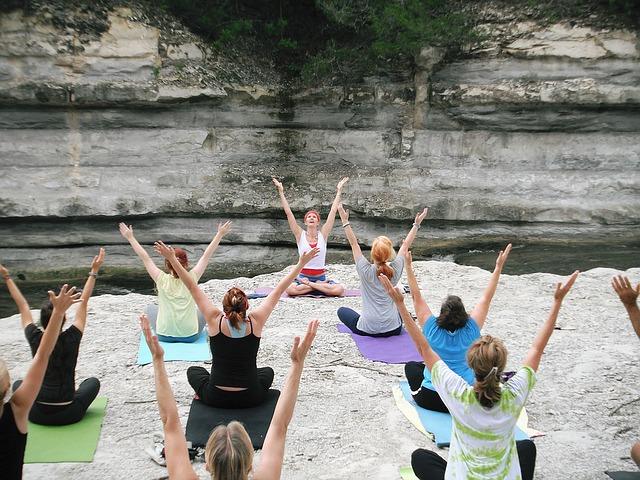 Group yoga class outdoors