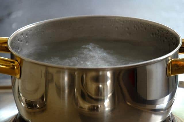 Boiling water in a pan
