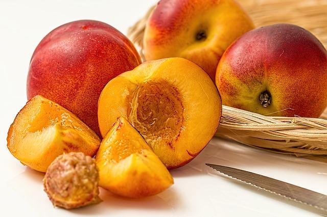 Photo of juicy and ripe peaches